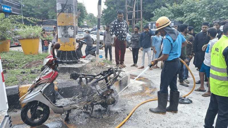 two-wheeler suddenly caught fire